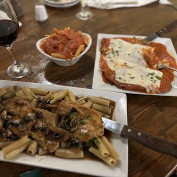 Del Pesto - a plate of pasta and a glass of wine - Italian Near Me - Jupiter, Florida