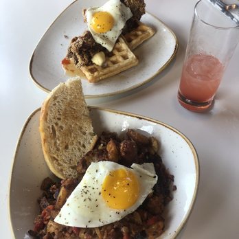 Everly - Sausage Potato Hash and chicken and waffles - New American Near Me - Madison, Wisconsin Everly - Sausage Potato Hash and chicken and waffles - New American Near Me - Madison, Wisconsin