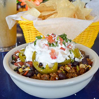Caliente - Now, we might be going a little dip crazy, but the 7 layers of goodness were not gonna miss this table for anything! Each layer of the 7-Lay - Tex-Mex Near Me - Houston, Texas
