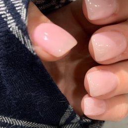 Acrylic nails with french pink gel color done by sofia. I like my nails short and thin and she had no problem accommodating to that.