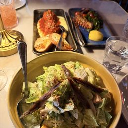 Cesar salad, meatballs and octopus