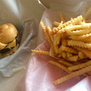 Paradise Pup - Burger looks small next to the large fries but it was not small. It was a nice big portion and thick. - Fast Food Near Me - Des Plaines, Illinois Paradise Pup - Burger looks small next to the large fries but it was not small. It was a nice big portion and thick. - Fast Food Near Me - Des Plaines, Illinois