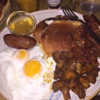 Le Vespe Cafe - The King: 2 eggs, 2 bacon, sausage, 2 pancakes, homefries, and maple syrup. - Breakfast & Brunch Near Me - Florence, FI Le Vespe Cafe - The King: 2 eggs, 2 bacon, sausage, 2 pancakes, homefries, and maple syrup. - Breakfast & Brunch Near Me - Florence, FI