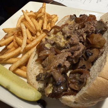 Molly's Restaurant & Bar - Cheesesteak sandwich with fantastic fries - American Near Me - Hanover, New Hampshire