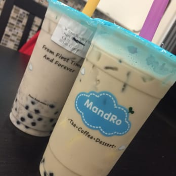 MandRo Teahouse - Addicted to milk tea! purple straw is the Hokkaido milk tea with pearl and egg pudding. The one with the orange straw is taro milk tea!! - Bubble Tea Near Me - Davis, California