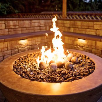 Limestone Landscaping - a fire pit with rocks and stones - Landscaping Near Me Limestone Landscaping - a fire pit with rocks and stones - Landscaping Near Me