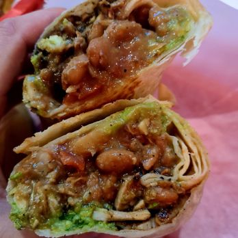The Taco Stand - Pollo asado burrito - nothing skimped out here! Fresh guac again and tender seasoned chunks of marinated chicken. - Mexican Near Me - Miami, Florida