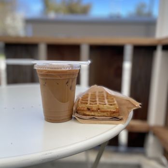 The Mill - Dirty Chai with Oat Milk & Waffle in Hand - Coffee & Tea Near Me - Sacramento, California The Mill - Dirty Chai with Oat Milk & Waffle in Hand - Coffee & Tea Near Me - Sacramento, California