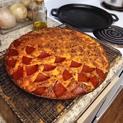 Clam & pepperoni pizza we made at the beach using a Gulf Side Pizza Maker.