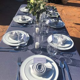 One of our tables, everything was rented from Party Jam except for the candle and flower vases. One of our tables, everything was rented from Party Jam except for the candle and flower vases.