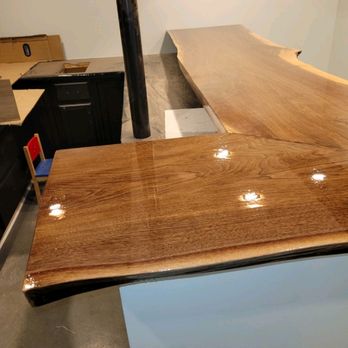 Eaton Home Improvements - Live edge stained and sealed. Put on a bar in a basement finish - General Contractors Near Me Eaton Home Improvements - Live edge stained and sealed. Put on a bar in a basement finish - General Contractors Near Me