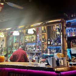 Grill Shack & Tiki Bar - Owner mixing up drinks