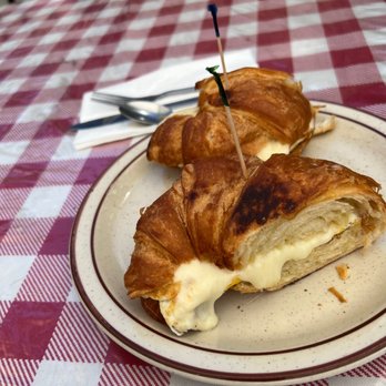 Just Breakfast - a croissant sandwich on a plate - Breakfast & Brunch Near Me - San Jose, California Just Breakfast - a croissant sandwich on a plate - Breakfast & Brunch Near Me - San Jose, California