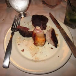 Gauchos Brazilian Steak House - From left, clockwise: Prime Rib, Lamb, Pork Loin, & Chicken wrapped in bacon. Drink on the right is the Pineapple Caipirinha.