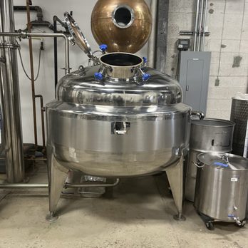 Dragon Distillery - a large stainless steel vessel with a copper ball on top - Distilleries Near Me - Frederick, Maryland Dragon Distillery - a large stainless steel vessel with a copper ball on top - Distilleries Near Me - Frederick, Maryland