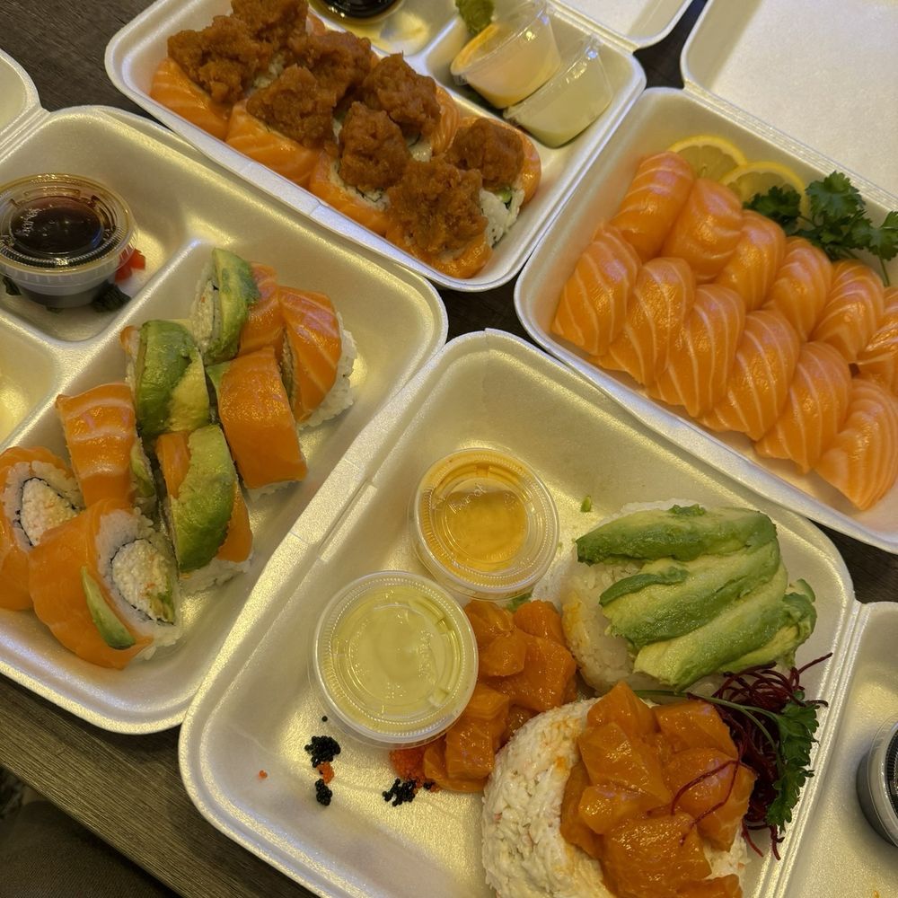 Top left Rainforest roll, top right Salmon nigiri, bottom left is Alaska Roll, bottom right is Salmon Ahi Tower Top left Rainforest roll, top right Salmon nigiri, bottom left is Alaska Roll, bottom right is Salmon Ahi Tower