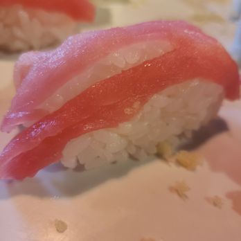 Sushi Mon - A couple of examples of how thinly one can slice fish and how thick a bed of rice can be. - Sushi Bars Near Me - Midlothian, Virginia Sushi Mon - A couple of examples of how thinly one can slice fish and how thick a bed of rice can be. - Sushi Bars Near Me - Midlothian, Virginia
