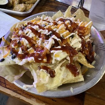 Maggie's R&R - Nachos...I didn't like the bbq sauce on them. - American Near Me - Fort Worth, Texas