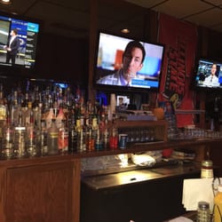 Kicks Bar & Grill - TV's behind the bar