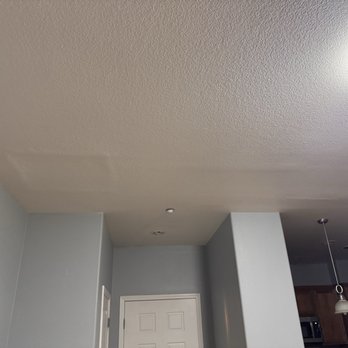 Complete Home Improvement - Ceiling shows the wood that was cut after painting which I expressed to have some sanding. - Painters Near Me
