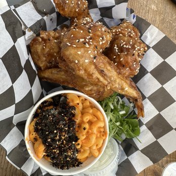 Frybaby - Soy Garlic Wings (top), Kimchi Mac and Cheese (bottom) - Chicken Wings Near Me - Portland, Oregon Frybaby - Soy Garlic Wings (top), Kimchi Mac and Cheese (bottom) - Chicken Wings Near Me - Portland, Oregon