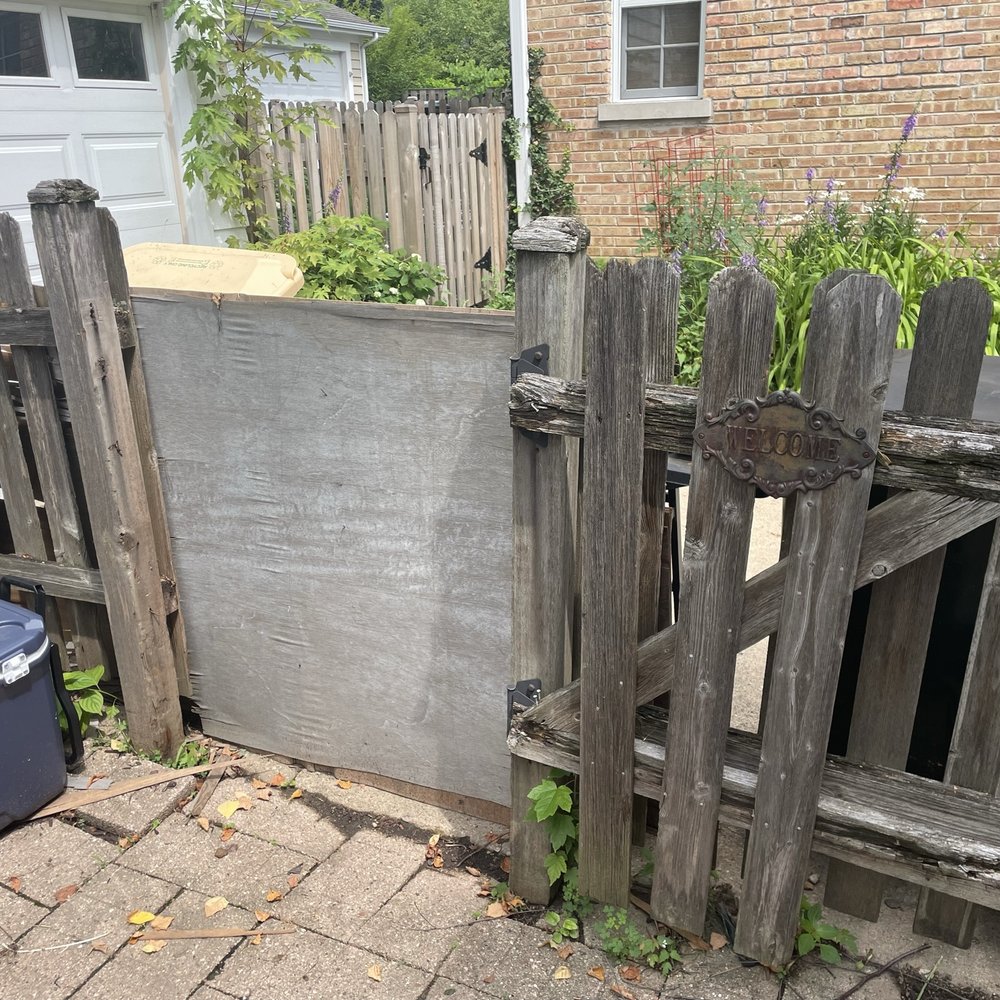 Painting and Such - Original Gate (missing) being covered by plywood. - Painters Near Me - Rock Falls, Illinois