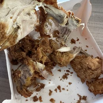 Popeyes Louisiana Kitchen - a partially eaten fried chicken - Chicken Wings Near Me - Centerton, Arkansas Popeyes Louisiana Kitchen - a partially eaten fried chicken - Chicken Wings Near Me - Centerton, Arkansas