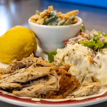 FoCo Cafe - a plate of food with chicken, mashed potatoes, and a lemon - Soup Near Me - Fort Collins, Colorado