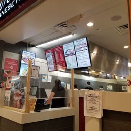 a woman at a fast food restaurant a woman at a fast food restaurant
