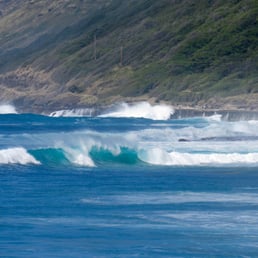 Big waves breaking over the trail to Kaena Point Big waves breaking over the trail to Kaena Point