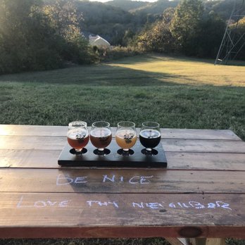 TailGate Brewery - Sunset & flight of beer on their back patio! Great chance to try new beers you normally wouldn't get a full pint of! Love their selection! - Breweries Near Me - Nashville, Tennessee TailGate Brewery - Sunset & flight of beer on their back patio! Great chance to try new beers you normally wouldn't get a full pint of! Love their selection! - Breweries Near Me - Nashville, Tennessee