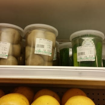 Bazaar On Cambridge - Half sour pickles and green tomatoes - International Grocery Near Me - Allston, Massachusetts
