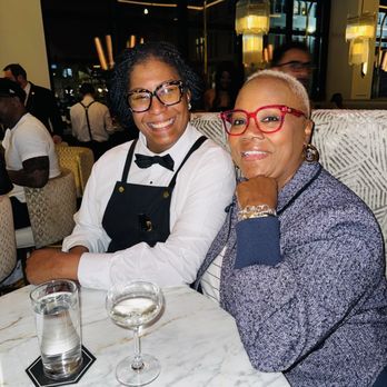 Prime + Proper - Keke server with a champagne toast! - Steakhouses Near Me - Nashville, Tennessee Prime + Proper - Keke server with a champagne toast! - Steakhouses Near Me - Nashville, Tennessee