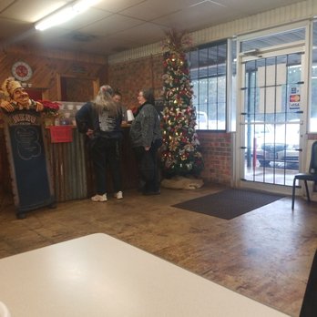 Lindsey's Lazy L Bar B Q - people standing around a table - Barbeque Near Me - Alto, Texas Lindsey's Lazy L Bar B Q - people standing around a table - Barbeque Near Me - Alto, Texas