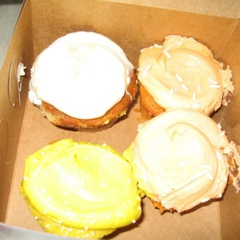 Sweet Mandy B's - Clockwise from left: Banana, Orange Creamsicle (x2) & Lemon Buttercream - Bakeries Near Me - Chicago, Illinois Sweet Mandy B's - Clockwise from left: Banana, Orange Creamsicle (x2) & Lemon Buttercream - Bakeries Near Me - Chicago, Illinois