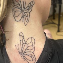 KBS Tattoos and Piercings - Butterflies.. the line work is so fucked!! I've never seen someone so bad at tattooing honestly. It's terrible!!