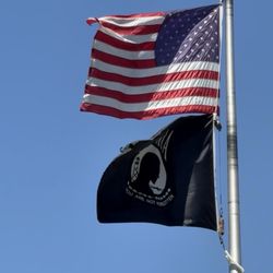 United States Postal Service - Exterior: USA flag flown above the POW-MIA flag at every USPS station