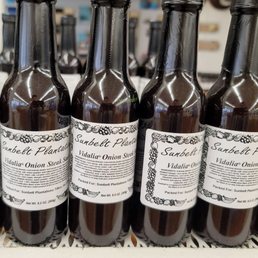 a row of bottles of wine a row of bottles of wine