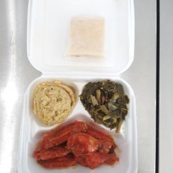Dreams Soul Food - Hot wing meal with collard greens and dressing...Delicious as well...
