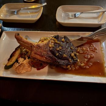 Weinkeller - BONE IN TOMAHAWK PORKCHOP - Wine Bars Near Me - Niagara Falls, Ontario