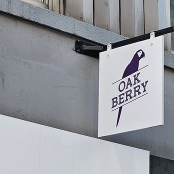 Oakberry Acai - a sign on a building - Acai Bowls Near Me - New York, New York Oakberry Acai - a sign on a building - Acai Bowls Near Me - New York, New York
