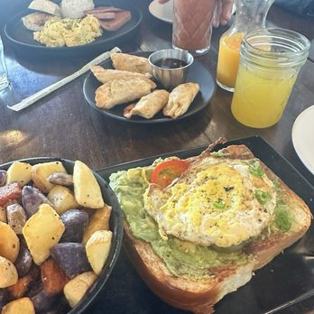 Shorehouse Kitchen - Dumplings, avocado toast with a side of potatoes. - Breakfast & Brunch Near Me - Carlsbad, California Shorehouse Kitchen - Dumplings, avocado toast with a side of potatoes. - Breakfast & Brunch Near Me - Carlsbad, California