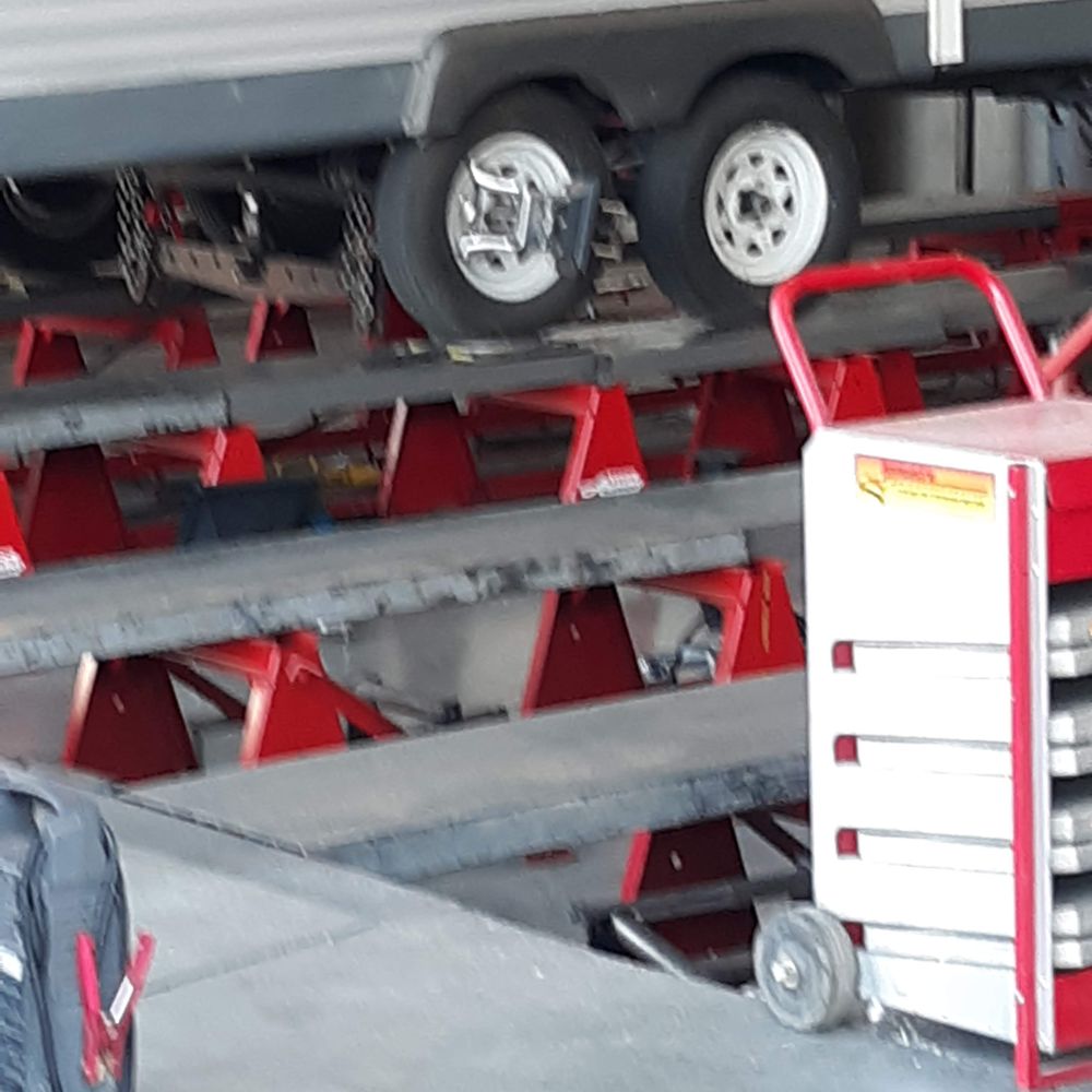 A Arrow Alignment - Front wheels and axle of my trailer getting checked and aligned. - Auto Repair Near Me - Las Vegas, Nevada