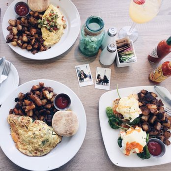 Lighthouse - Top: Crab Omelette , Left: American Omelette, Right: Crab Cake Benedict, Top Right: Bikinitini cocktail - Breakfast & Brunch Near Me - Newport Beach, California