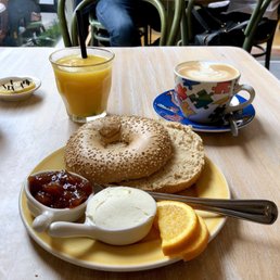 Good Morning with sesame sourdough bagel and cappuccino