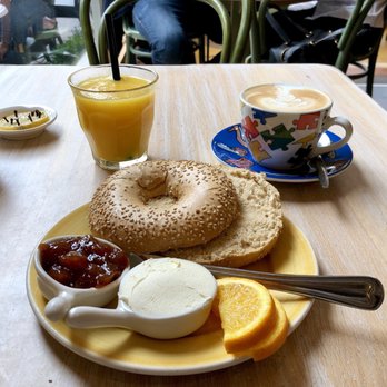 Bagels & Beans - Good Morning with sesame sourdough bagel and cappuccino - Coffee & Tea Near Me - Amsterdam, New Hampshire