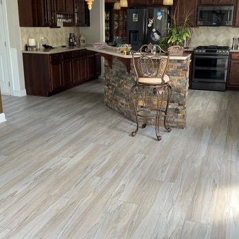 Kirby's Remodeling - a kitchen with wood floors - Flooring Near Me - Mechanicsburg, Pennsylvania