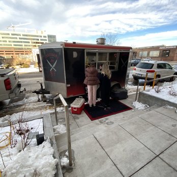 Stromans - a woman standing in front of a food truck - Food Trucks Near Me Stromans - a woman standing in front of a food truck - Food Trucks Near Me