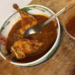 Los Vecinos Market - Twenty minute pressure cooked $1.50/lb chicken legs with their chopped frozen okra and canned tomatos.