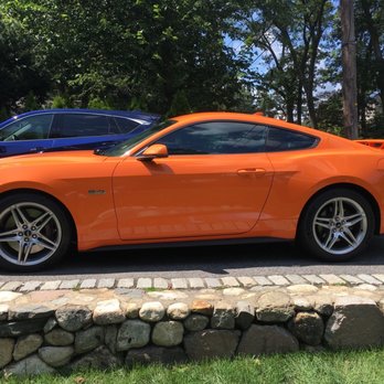 Solar Solutions Window Tinting - Orange Mustang tinted windows - Car Window Tinting Near Me - Winchester, Massachusetts Solar Solutions Window Tinting - Orange Mustang tinted windows - Car Window Tinting Near Me - Winchester, Massachusetts